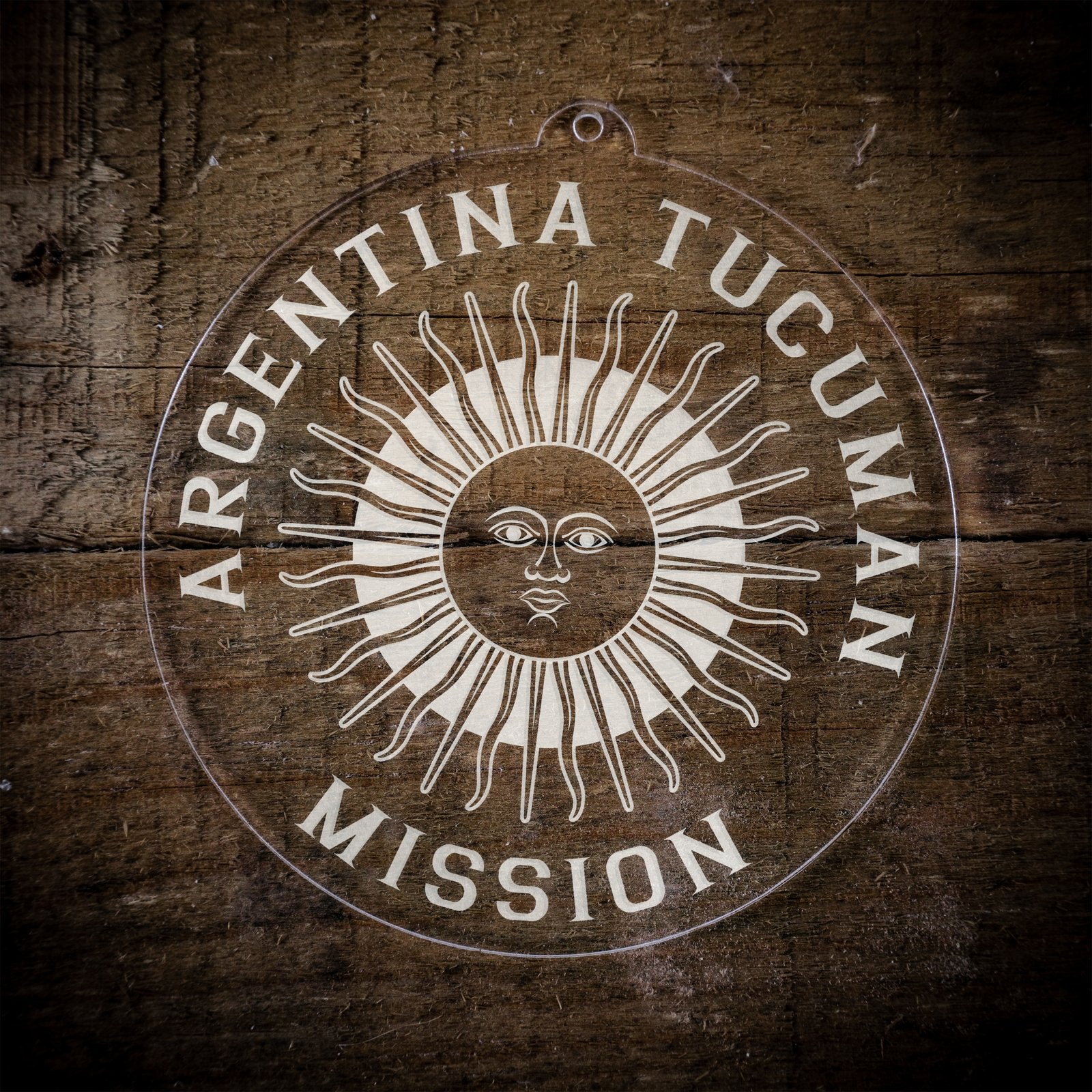 LDS Argentina Tucuman Mission Christmas Ornament laying on a Wooden Background