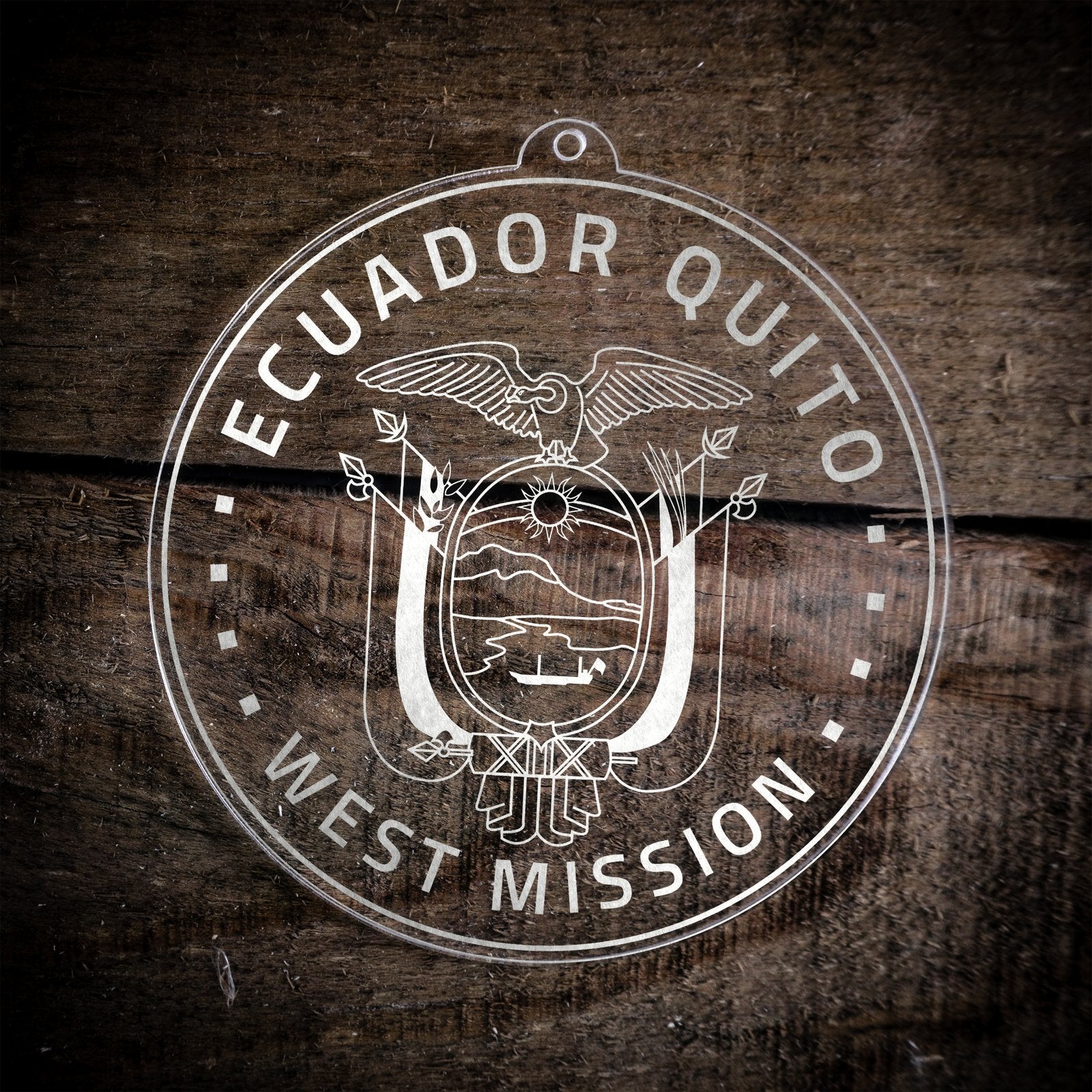 LDS Ecuador Quito West Mission Christmas Ornament laying on a Wooden Background