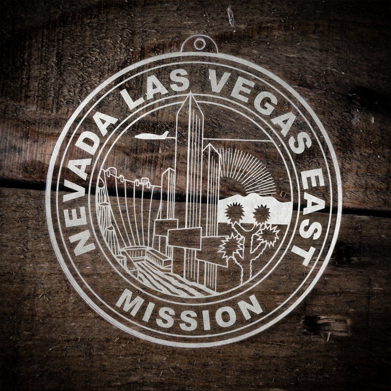 LDS Nevada Las Vegas East Mission Christmas Ornament laying on a Wooden Background