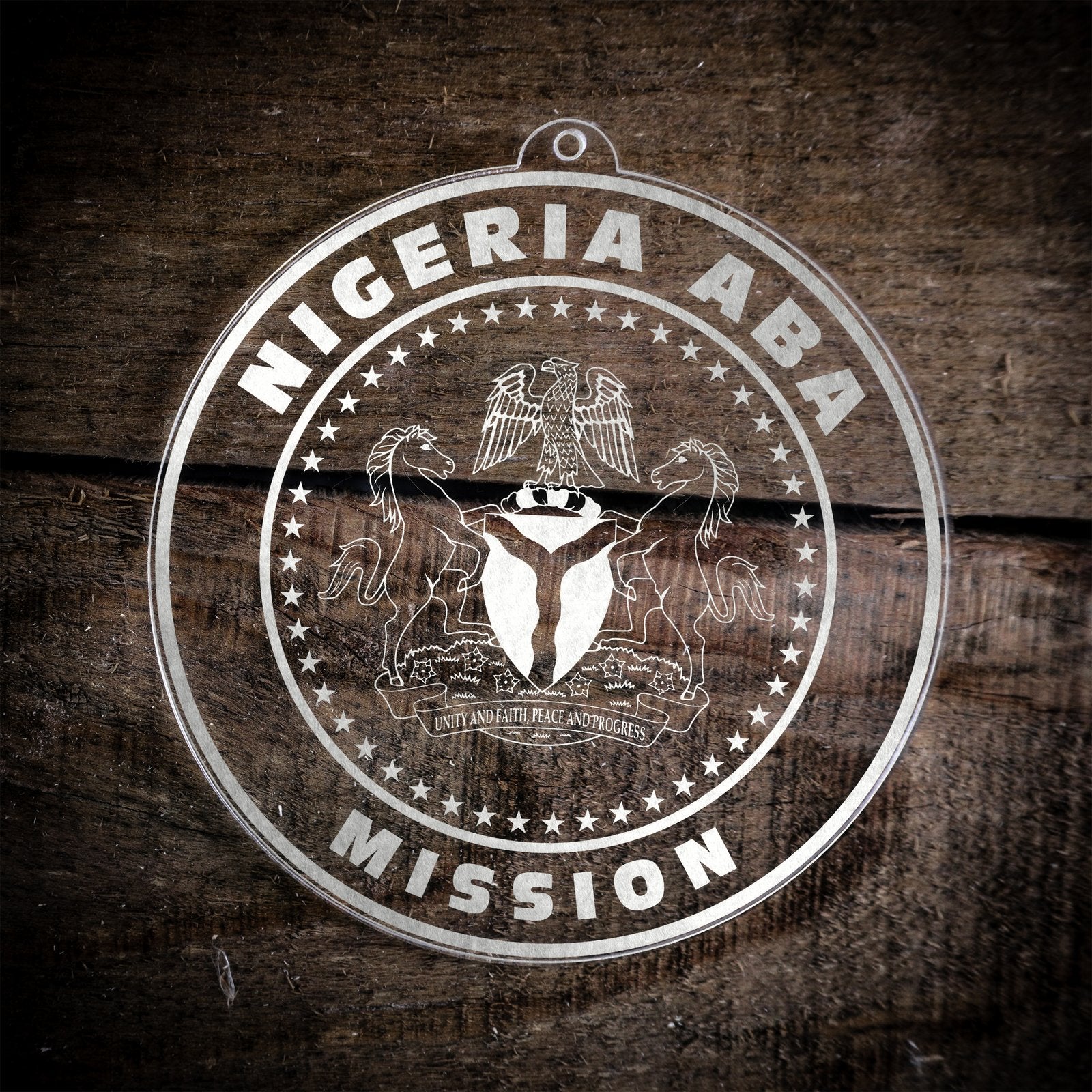 LDS Nigeria Aba Mission Christmas Ornament laying on a Wooden Background