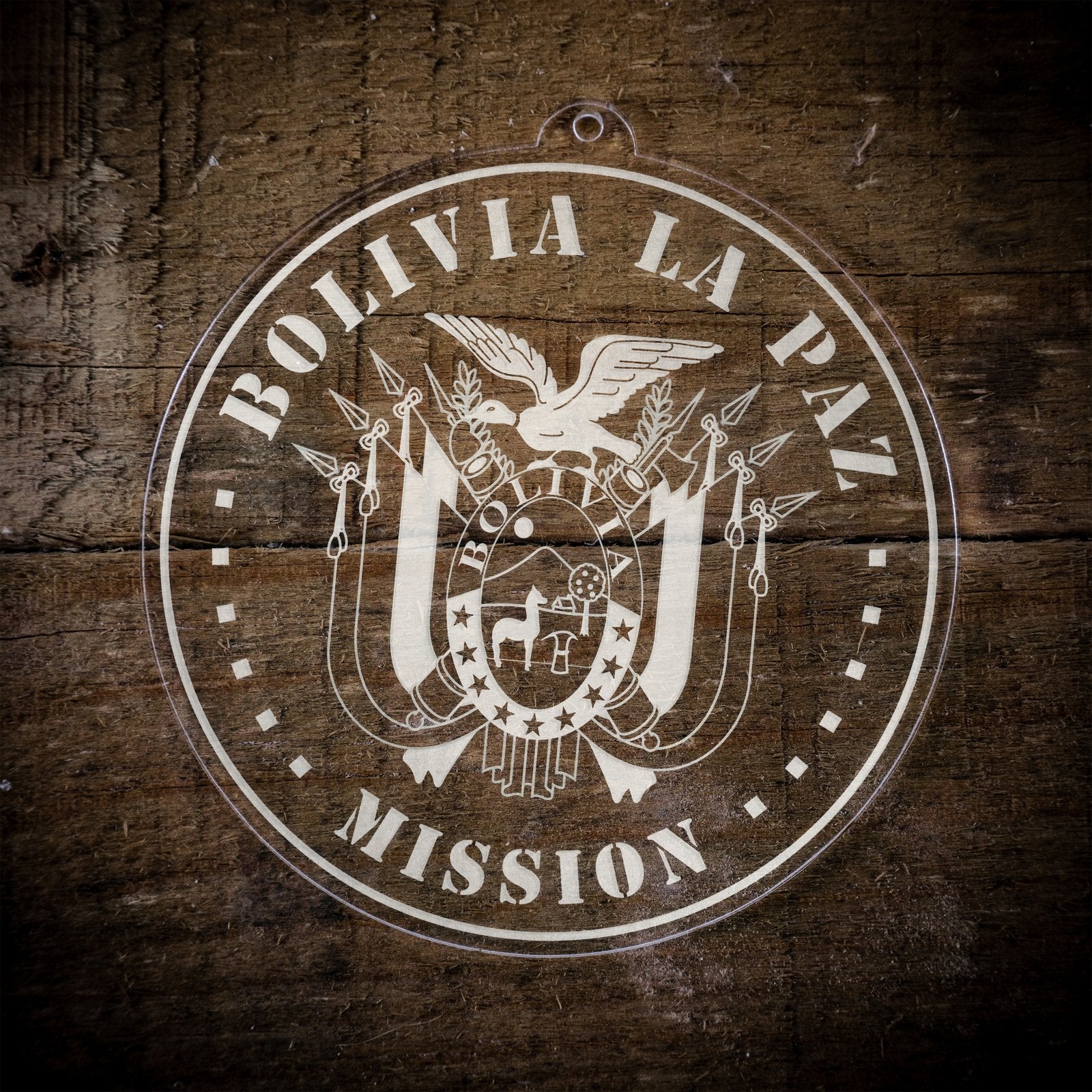 LDS Bolivia La Paz Mission Christmas Ornament laying on a Wooden Background