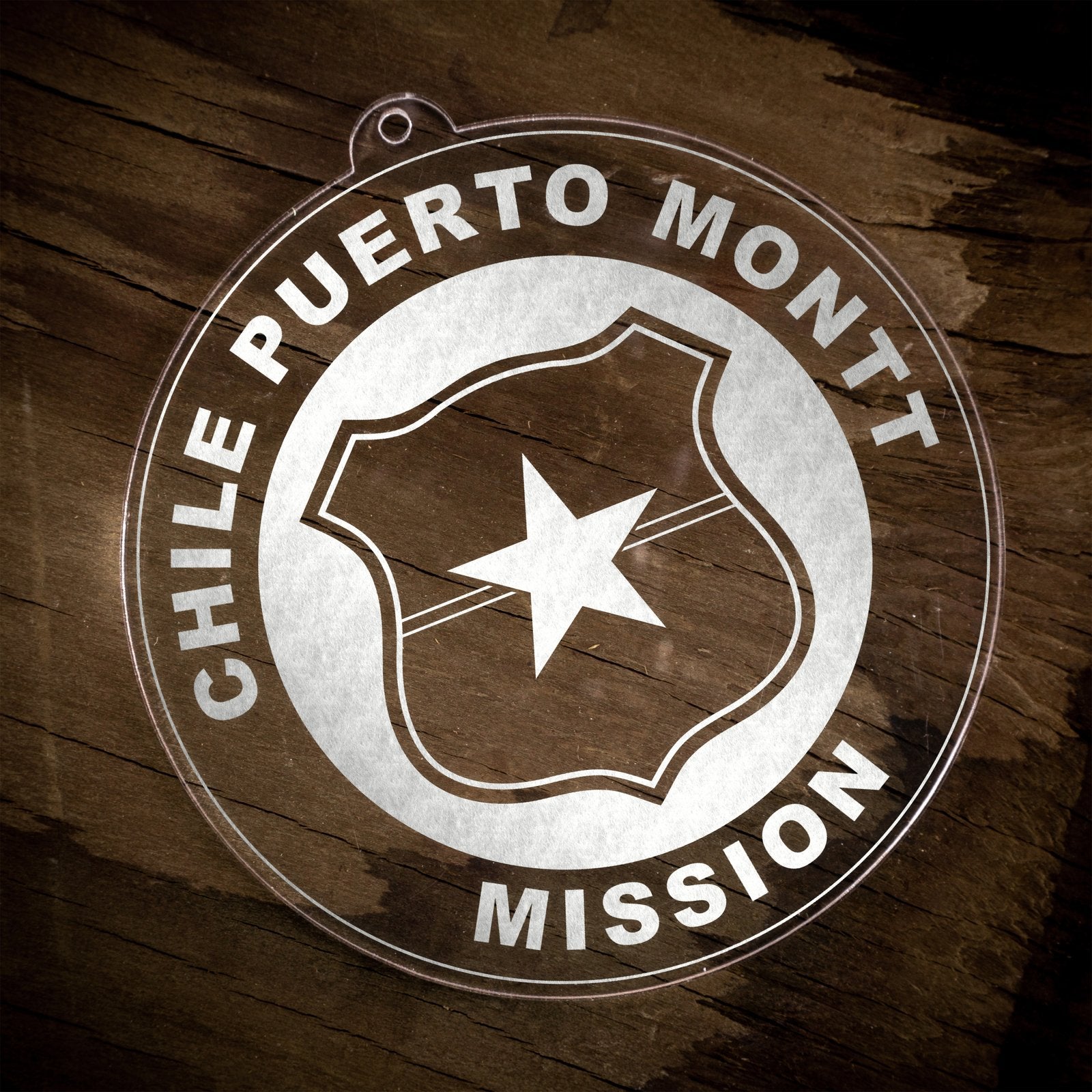 LDS Chile Puerto Montt Mission Christmas Ornament laying on a Wooden Background