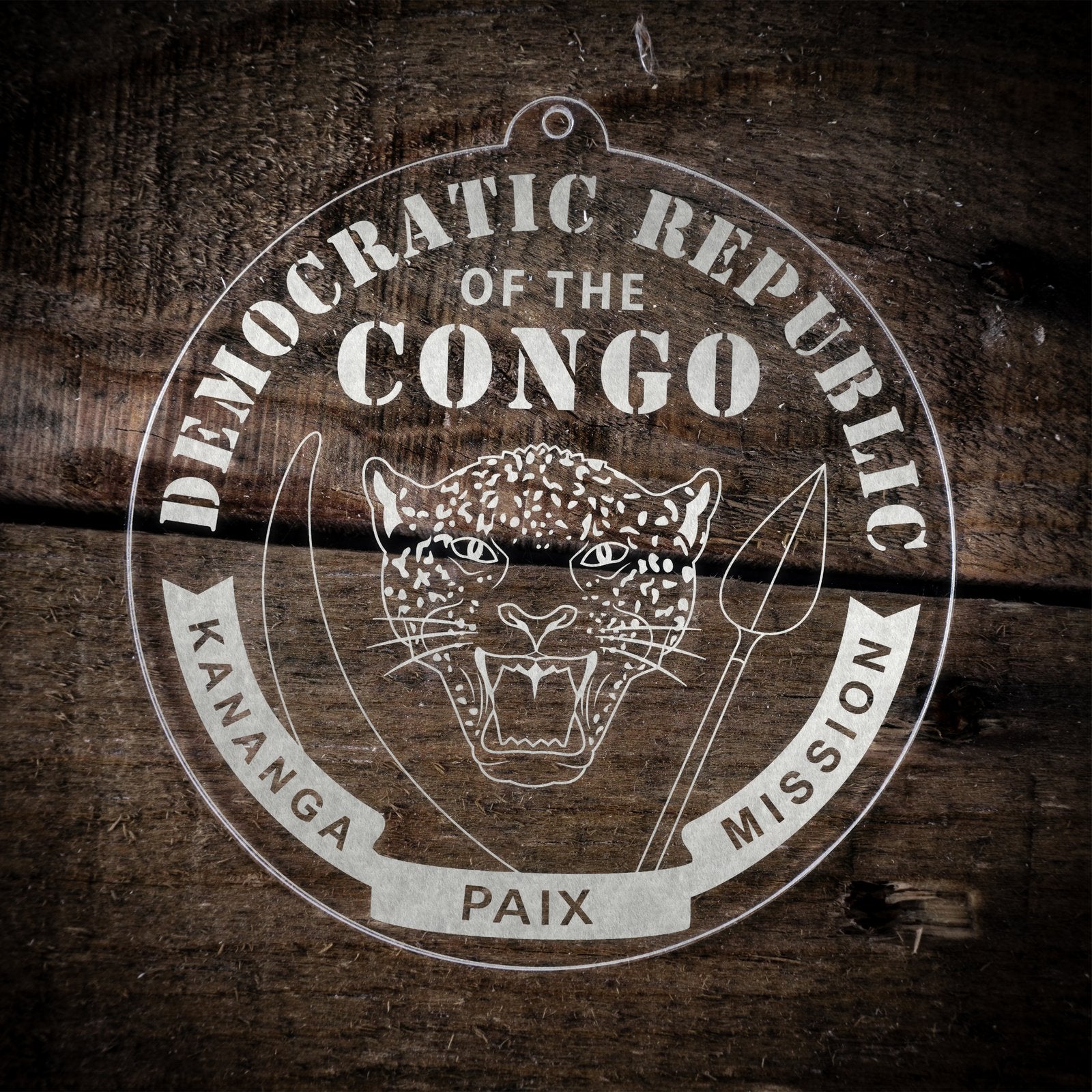 LDS Democratic Republic of the Congo Kananga Mission Christmas Ornament laying on a Wooden Background