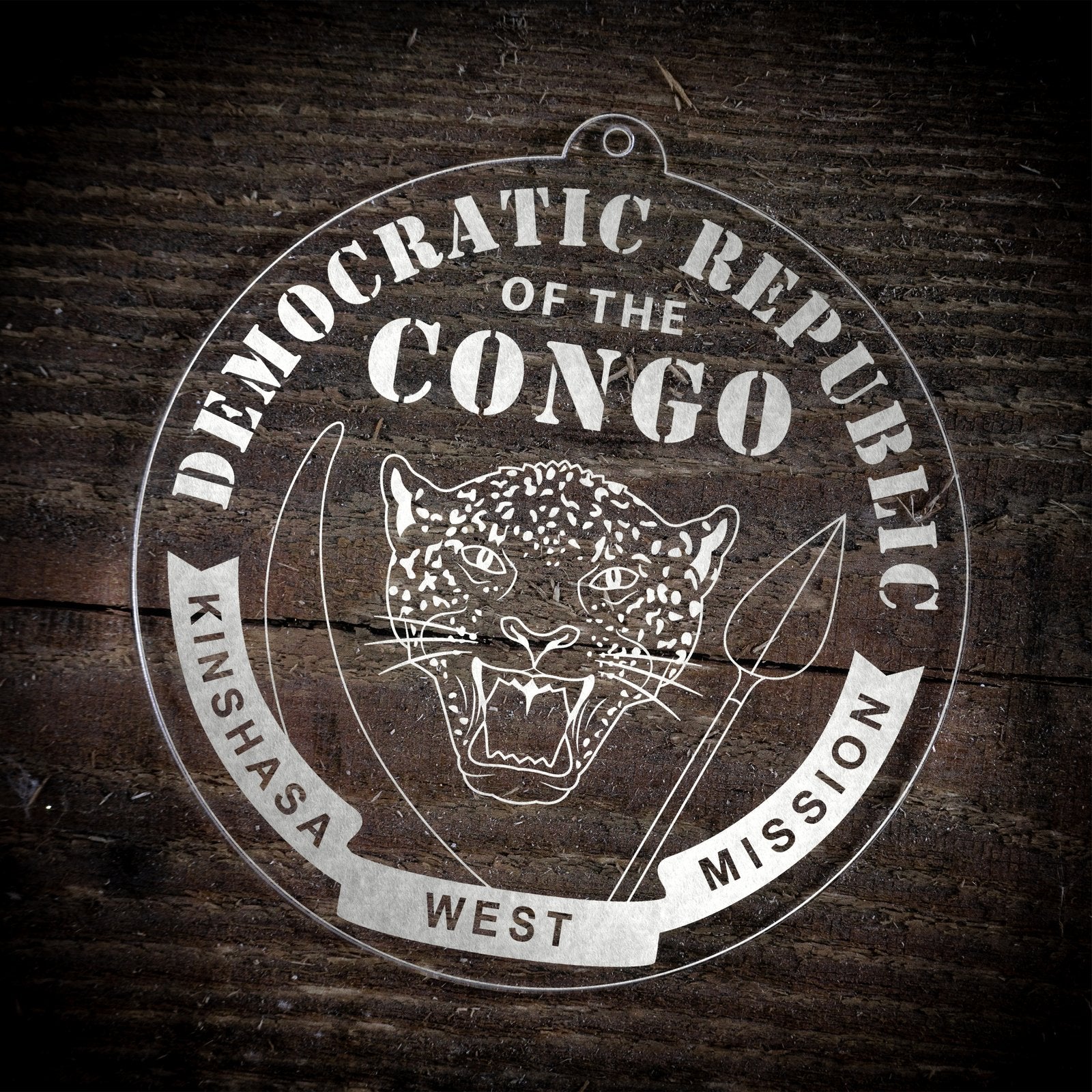 LDS Democratic Republic of the Congo Kinshasa West Mission Christmas Ornament laying on a Wooden Background