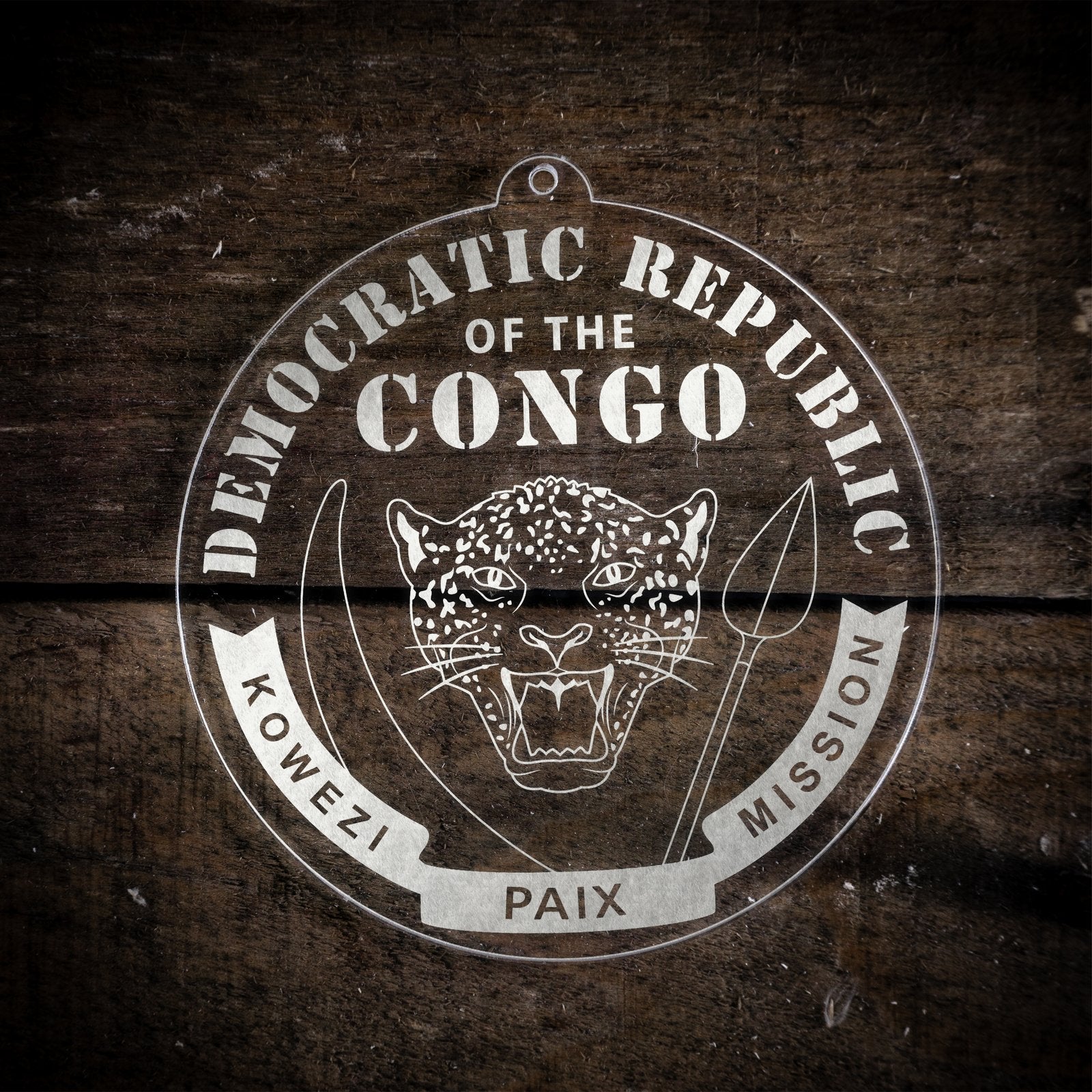 LDS Democratic Republic of the Congo Kolwezi Mission Christmas Ornament laying on a Wooden Background