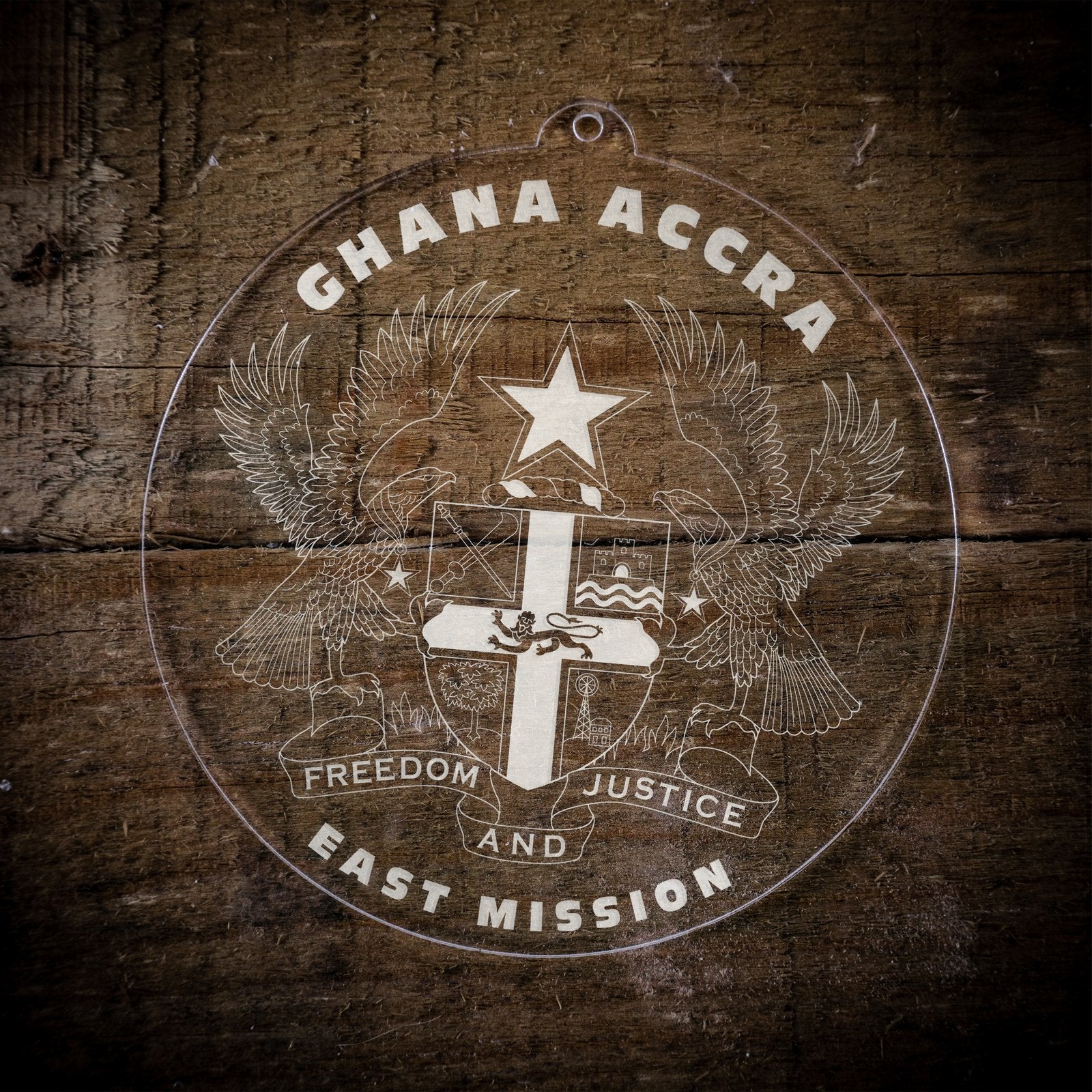 LDS Ghana Accra East Mission Christmas Ornament laying on a Wooden Background