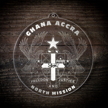 LDS Ghana Accra North Mission Christmas Ornament laying on a Wooden Background