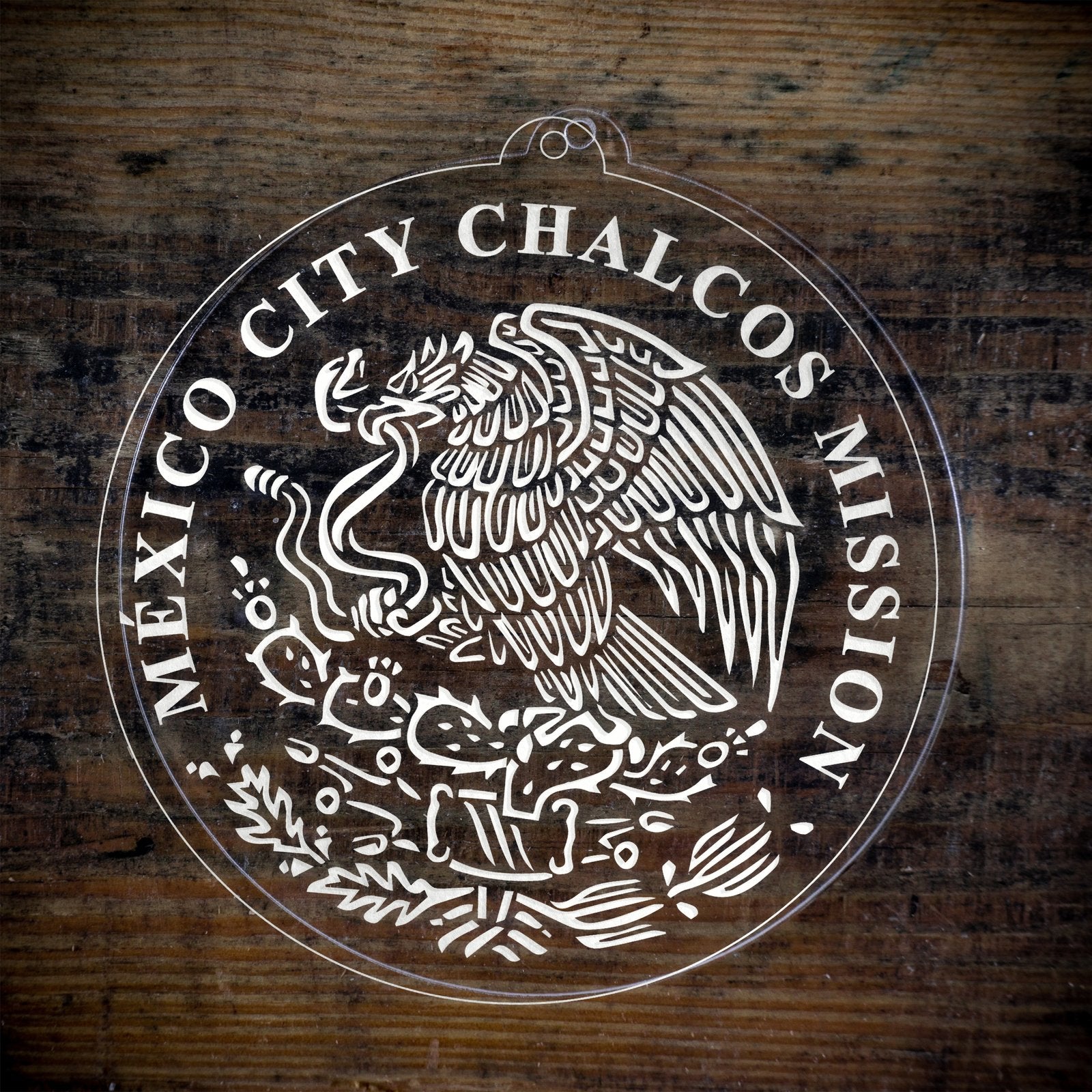 LDS Mexico Mexico City Chalcos Mission Christmas Ornament laying on a Wooden Background