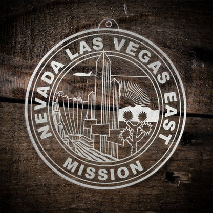 LDS Nevada Las Vegas East Mission Christmas Ornament laying on a Wooden Background