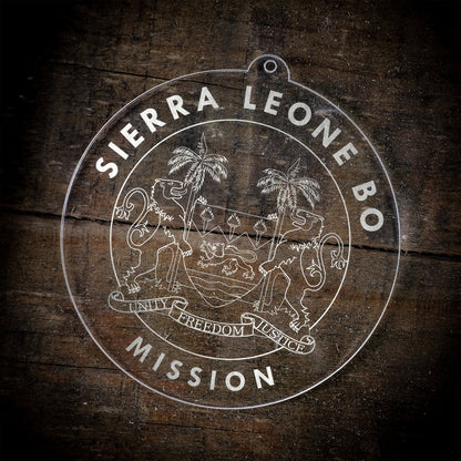 LDS Sierra Leone Bo Mission Christmas Ornament laying on a Wooden Background