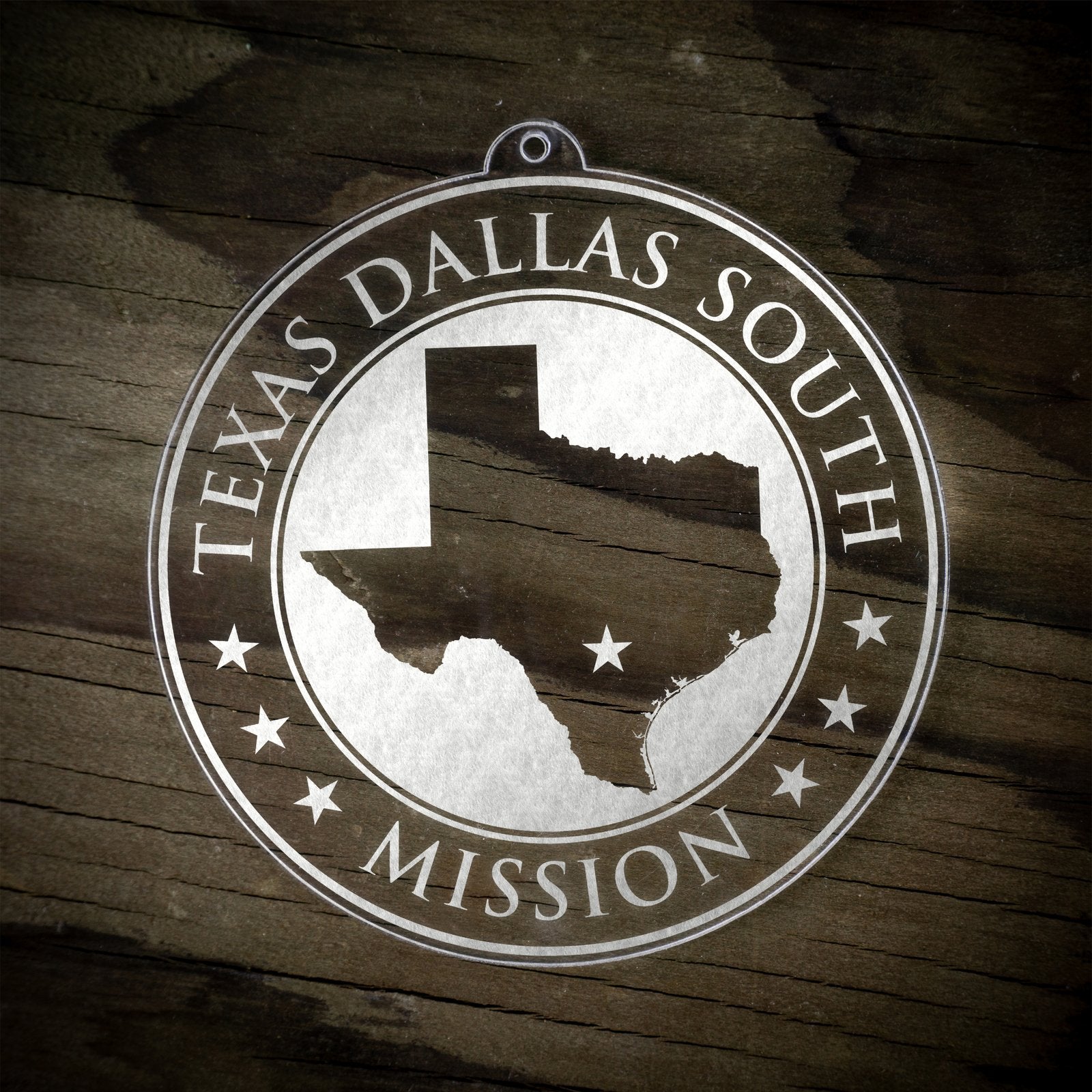 LDS Texas Dallas South Mission Christmas Ornament laying on a Wooden Background