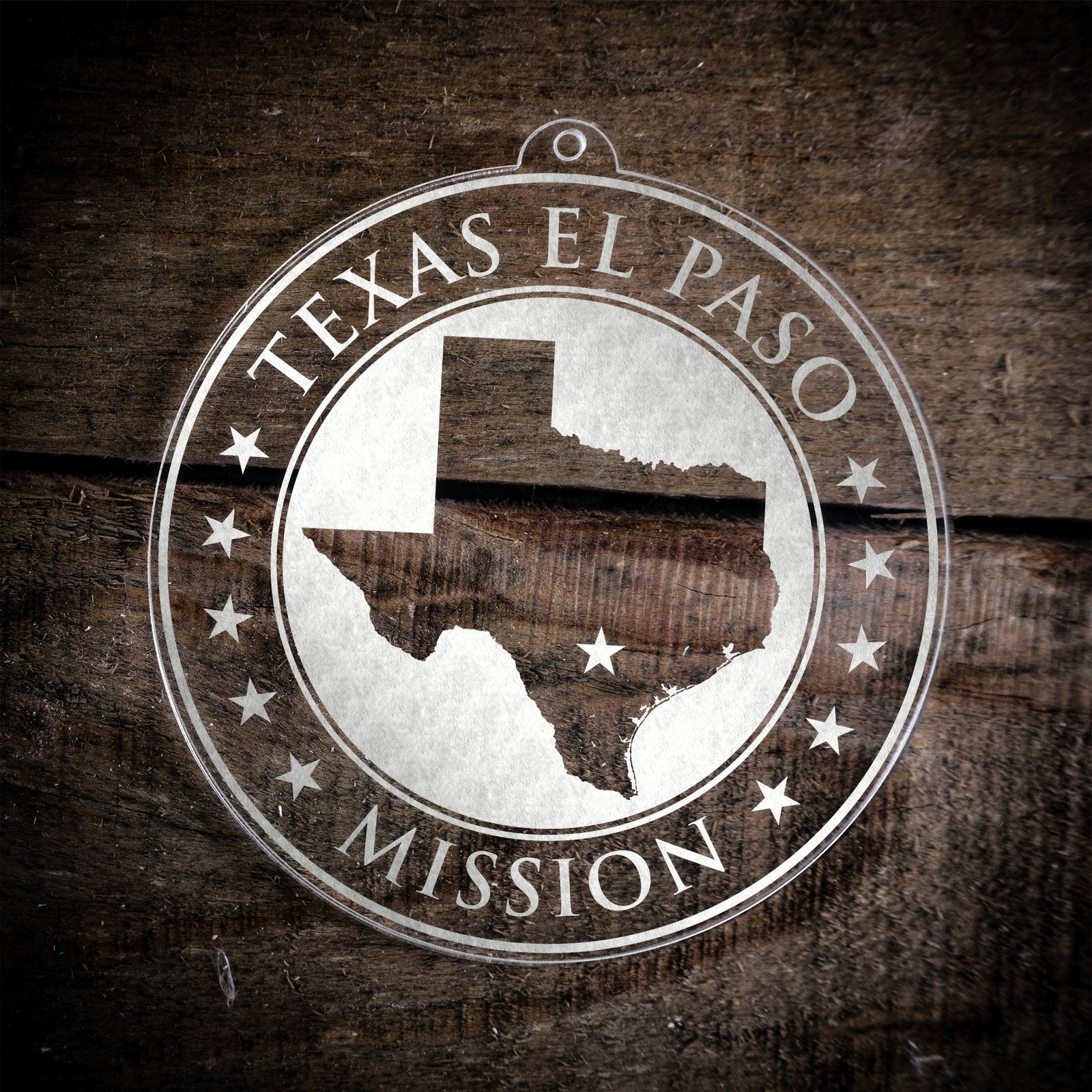 LDS Texas El Paso Mission Christmas Ornament laying on a Wooden Background